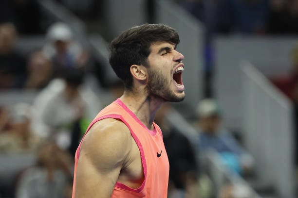 Carlos Alcaraz of Spain reacts in the Men's singles final match against Jannik Sinner of Italy on Day 10 of the China Open at National Tennis Center...