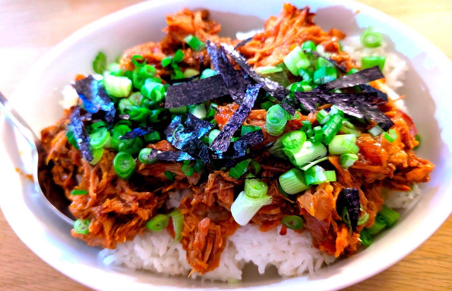Rice, pulled pork, green onions, and nori. Dinner! Rice, pulled pork, green onions, and nori. Dinner!
