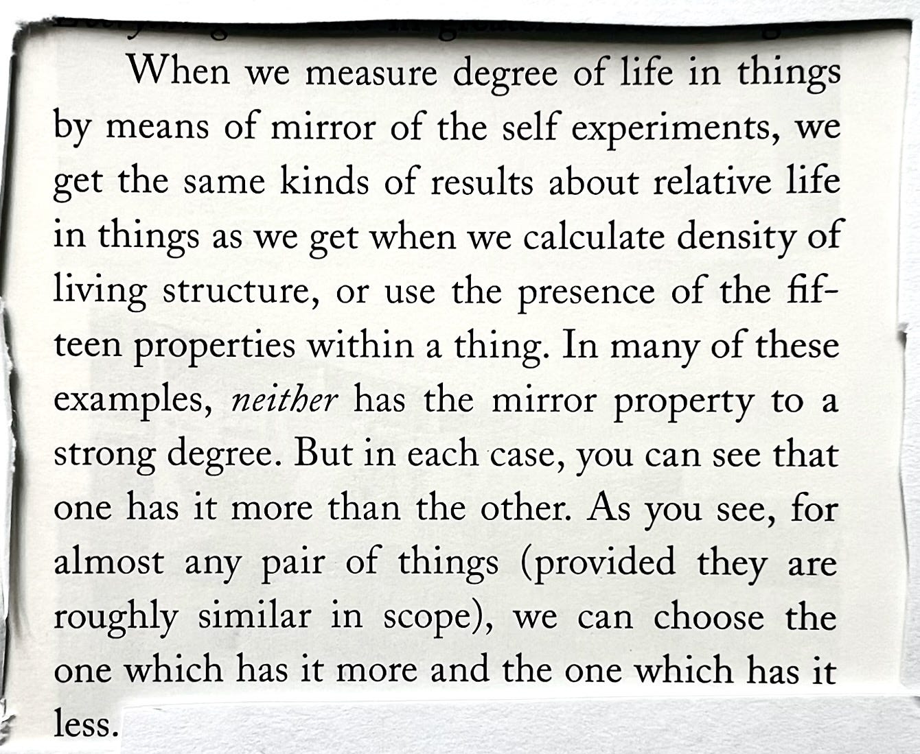 A page from The Nature of Order, in which Alexander describes judging the relative "degree of life" of two things by comparing them in pairs.