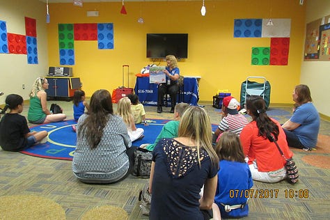 children holding books, reading books, and attending a presentation during a variety of public summer reading programs