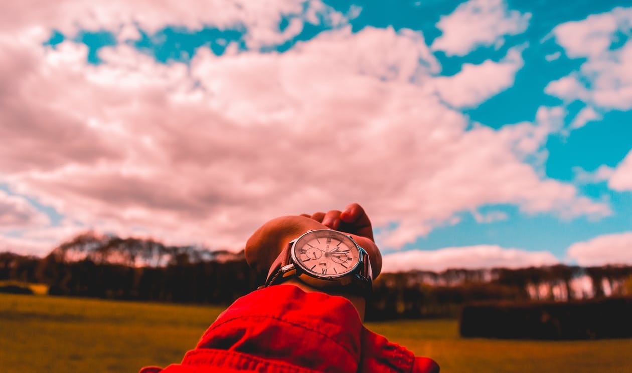Free Person in Red Shirt Wearing Watch Stock Photo