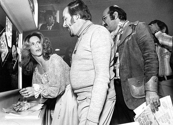 Marilyn Chambers signs autographs at a record sales conference at L.A.'s Century Plaza Hotel in 1977. Related: Marilyn Chambers dies at 56; '70s porn star and Ivory Snow model