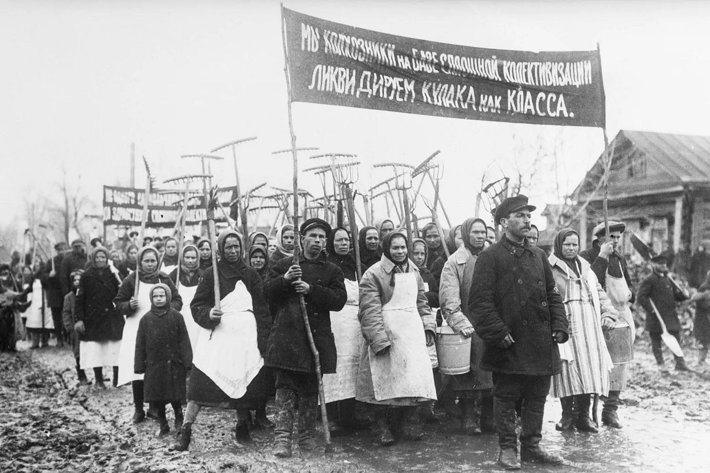 “We, the collective farmers, will liquidate the Kulaks as a class” A Soviet peasant rally against upper class peasants (Kulaks) during the collectivization of farmlands, Soviet Russia, 1931