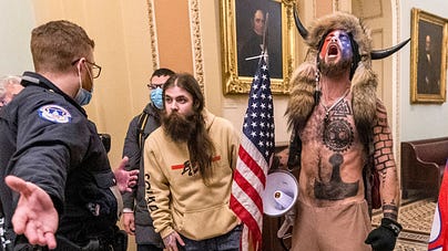 Jacob Chansley, 'QAnon Shaman,' to get his Jan. 6 helmet, spear back - The  Washington Post