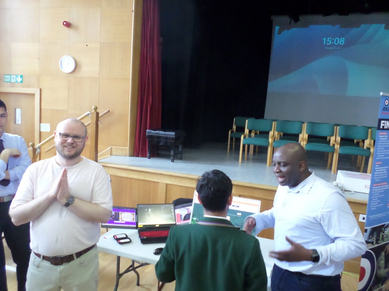 Local professionals in a school hall, sharing their knowledge and experience