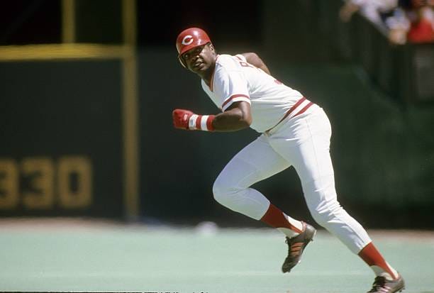 S: Outfielder Dave Parker of the Cincinnati Red takes off from first base during a circa mid 1980's Major League Baseball game at Riverfront Stadium...