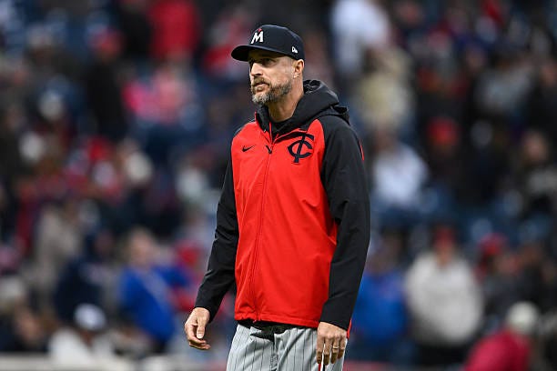 Manager Rocco Baldelli of the Minnesota Twins walks off the field after making a pitching change during the seventh inning against the Cleveland...