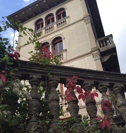villa magnolia glimpse of tower through red leaves villa magnolia glimpse of tower through red leaves