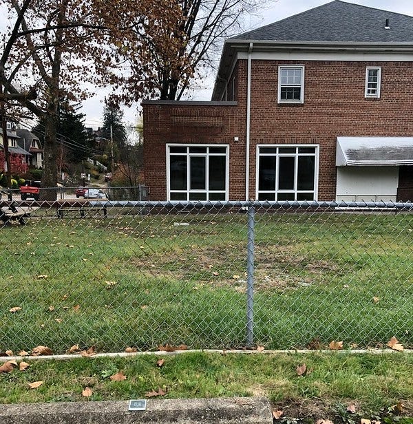 Yard and side view of Brighton Heights Healthy Active Living Center, Brighton Heights.