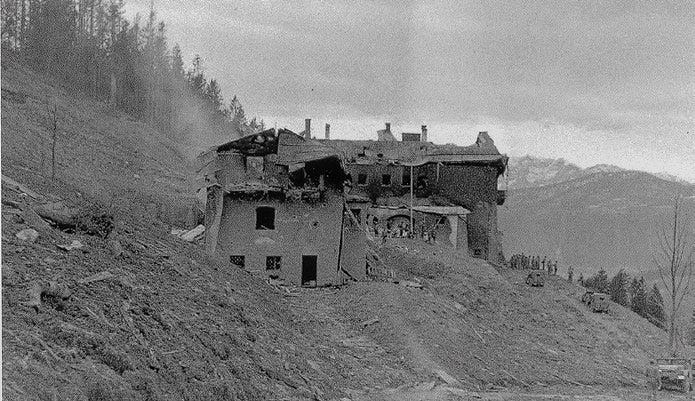 The ruins of Hitler’s Berghof mountain residence at Berchtesgaden in 1945. After documenting the destruction of Berlin, JFK traveled into one of the most symbolic centers of Nazi power before writing his famous reflection on political legend and historical memory.