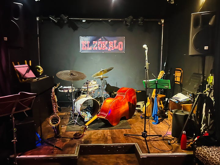 Scenes of a Parisian music venue called El Zokalo in the 20th arrondissment with a Mexican atmosphere and musicians performing