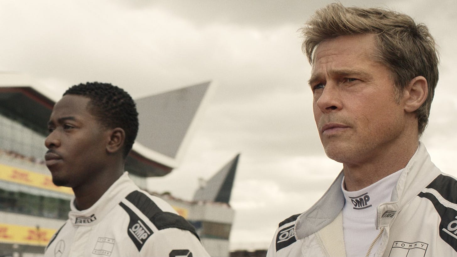 Damson Idris as Joshua Pierce and Brad Pitt as Sonny Hayes in F1: The Movie Damson Idris as Joshua Pierce and Brad Pitt as Sonny Hayes in F1: The Movie