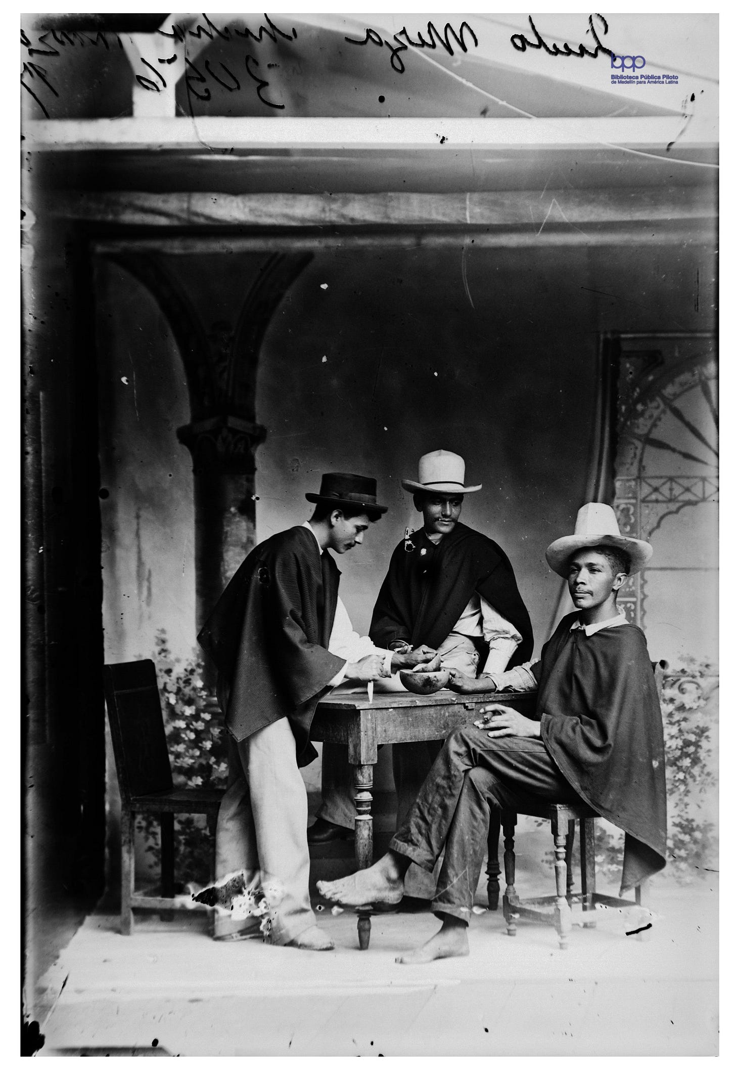 Three men enjoy chicha in Medellín, Antioquia, Colombia, in 1897. Three men enjoy chicha in Medellín, Antioquia, Colombia, in 1897.