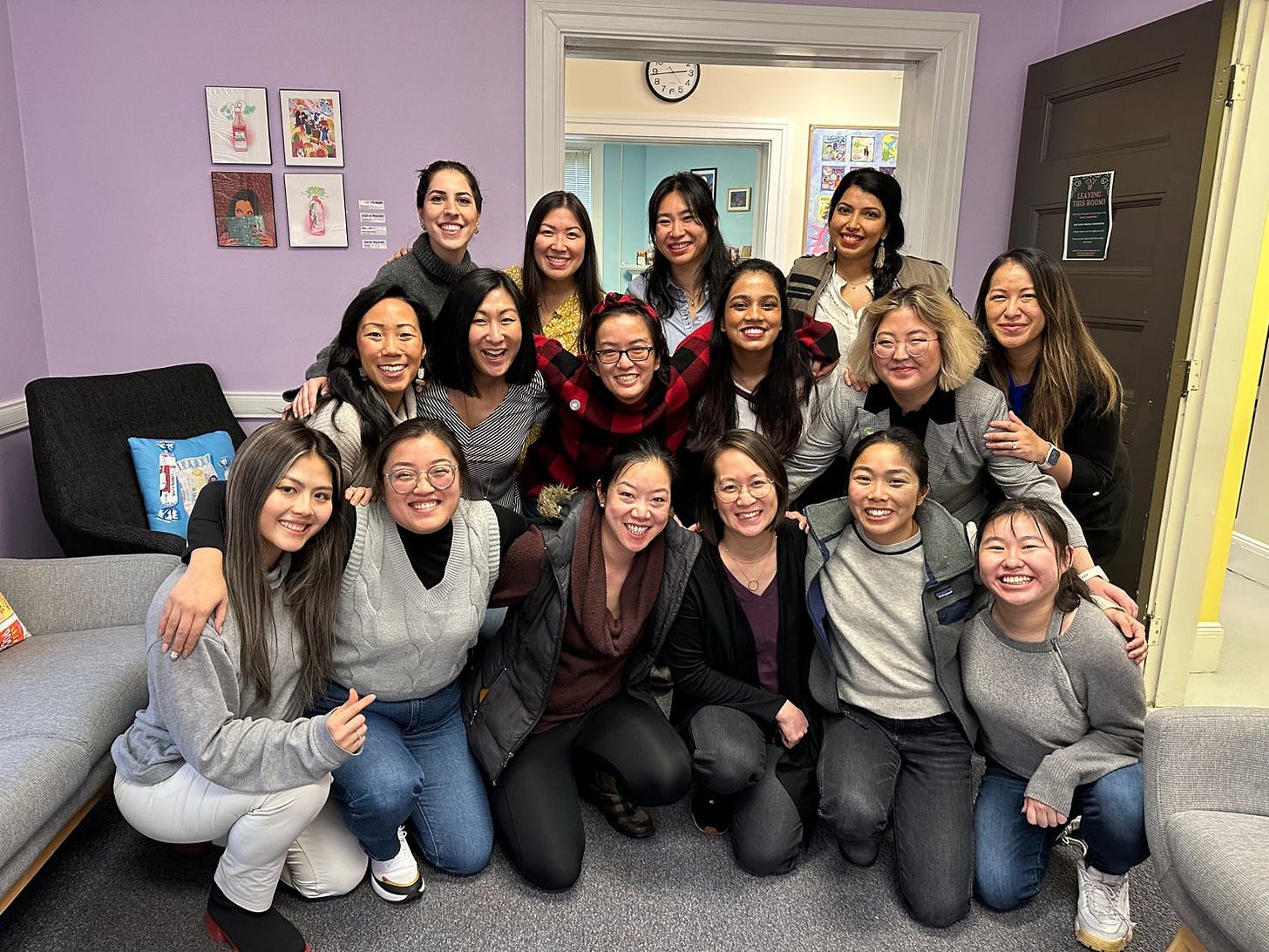 Group photo of 16 Asian women in Tufts Asian American Center. Group photo of 16 Asian women in Tufts Asian American Center.