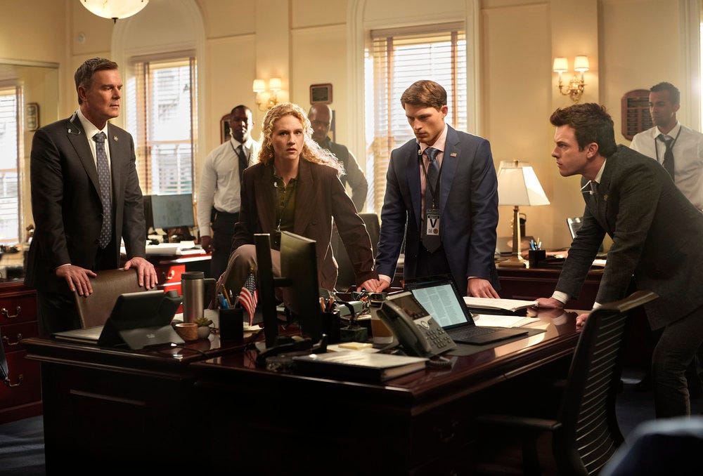 LINE OF FIRE -- "Cabin Pressure" Episode 106 -- Pictured: Peter Krause, Kat Cunning, Taylor Bloom, and Tommy O'Brien as Mike, Clare, Russ, and Micah Hollingsworth gathered in an office during the hijacking crisis LINE OF FIRE -- "Cabin Pressure" Episode 106 -- Pictured: Peter Krause, Kat Cunning, Taylor Bloom, and Tommy O'Brien as Mike, Clare, Russ, and Micah Hollingsworth gathered in an office during the hijacking crisis