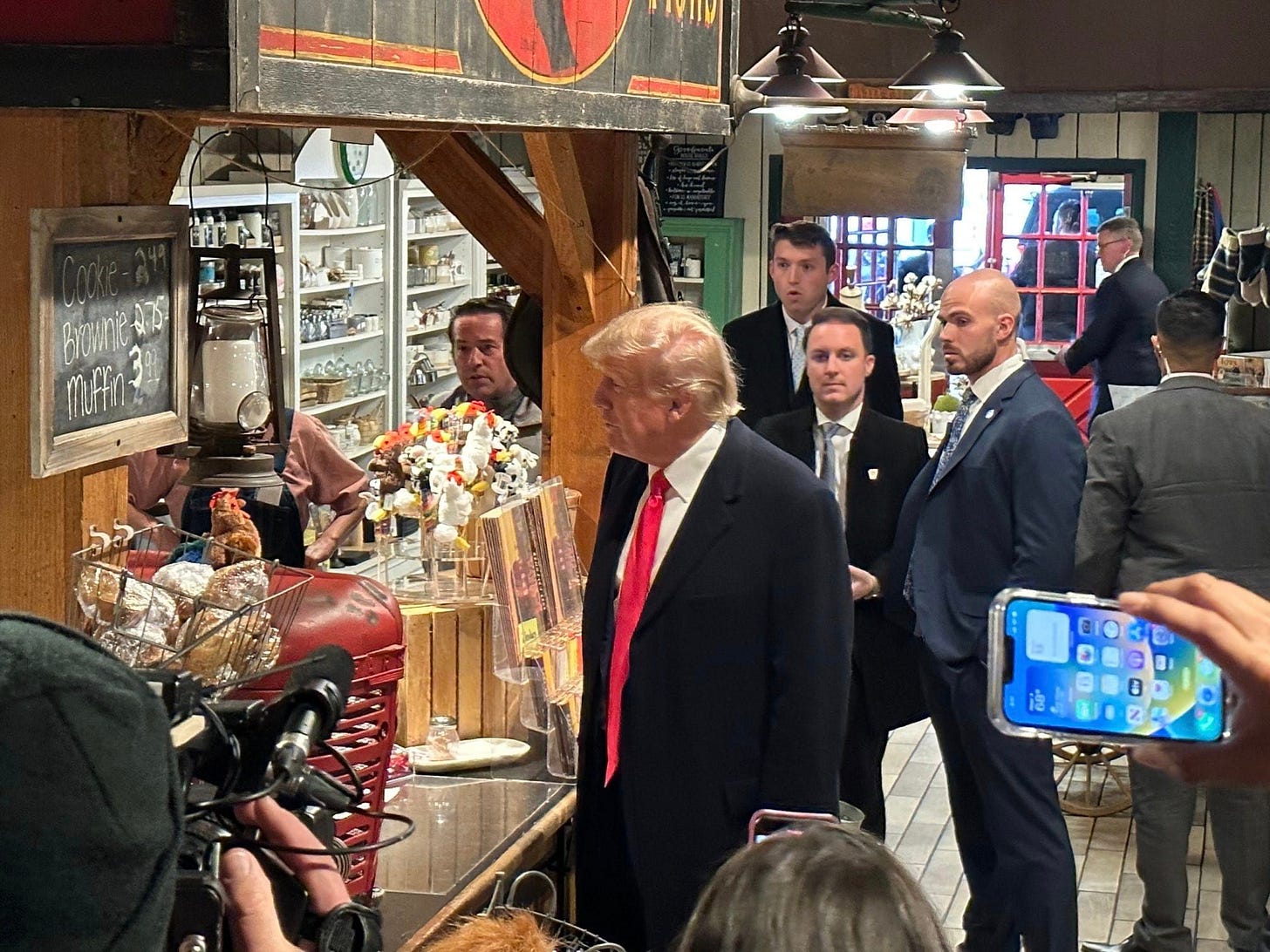 May be an image of 7 people, people standing and indoor