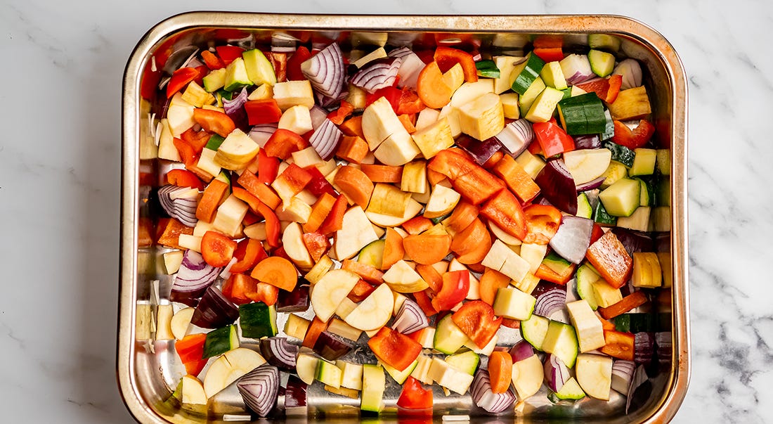 Mediterranean Tofu & Vegetable Sheet Pan with Herby Yogurt Sauce 