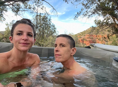 Various pictures of Meg and Andrea in pools and hot tubs, and in love.