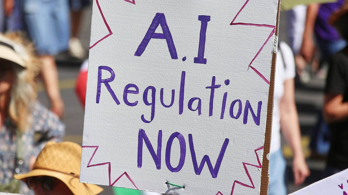 Credit: Alamy. sign with the inscription AI Regulation now Credit: Alamy. sign with the inscription AI Regulation now