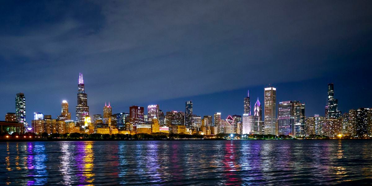 A nighttime view of the Chicago skyline from out on Lake Michigan.