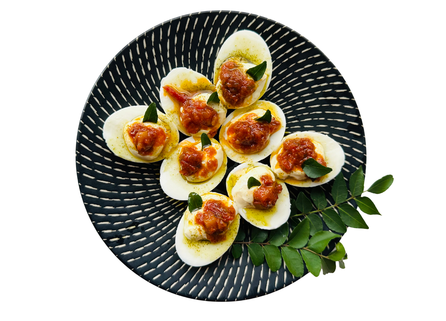 Devilled eggs with curry leaf oil