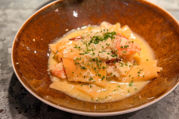 Courgettes stuffed with prawns; harm-torn pasta with brown crab