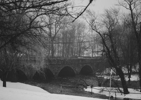 Black and white photos of the town of Natick, MA.