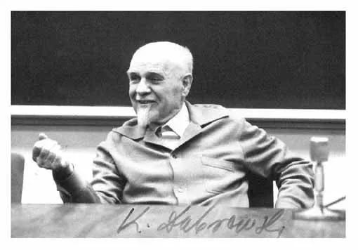 Black and white portrait photograph of Polish psychiatrist Charles Dabrowski, an older man in a suit and tie, looking directly at the camera.