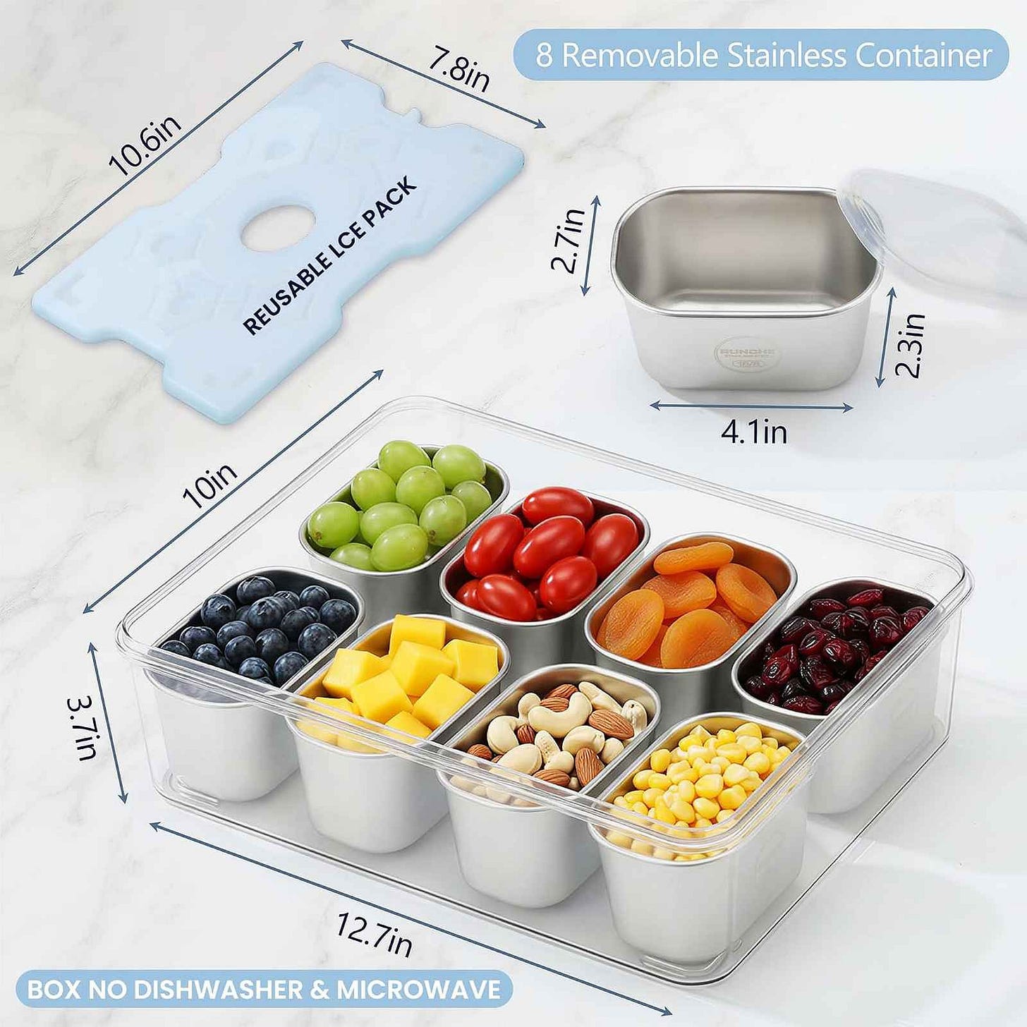 An open stainless snack box filled with snacks, with a flat ice pack visible underneath the containers. An open stainless snack box filled with snacks, with a flat ice pack visible underneath the containers.