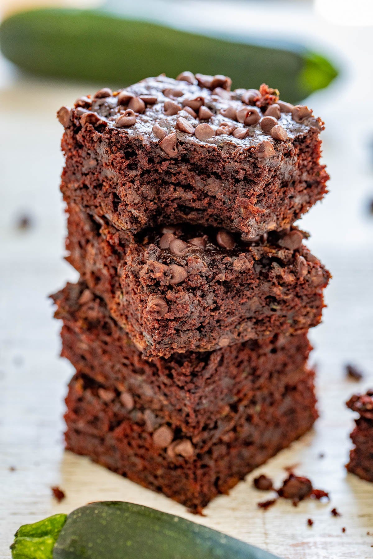 Zucchini Brownies - The BEST zucchini brownies that are EASY, made in one bowl, and no mixer required! Soft, fudgy, and almost taste like rich chocolate cake. They're filled and topped with mini chocolate chips to add even more fabulous chocolate flavor. And NO, you cannot taste the zucchini at all - promise! Zucchini Brownies - The BEST zucchini brownies that are EASY, made in one bowl, and no mixer required! Soft, fudgy, and almost taste like rich chocolate cake. They're filled and topped with mini chocolate chips to add even more fabulous chocolate flavor. And NO, you cannot taste the zucchini at all - promise!