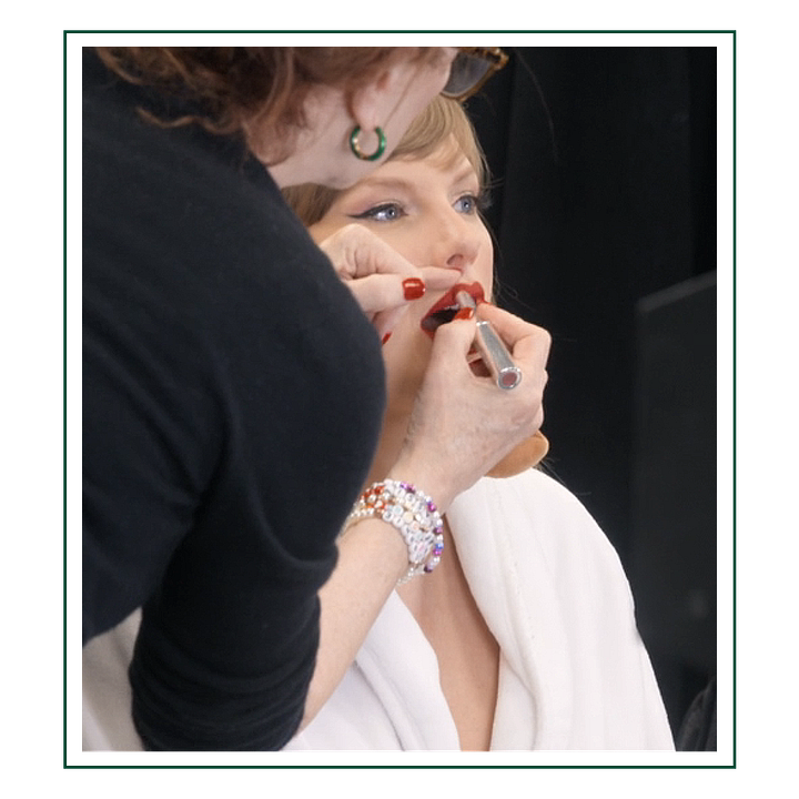 Taylor Swift getting her makeup done behind-the-scenes for the Eras Tour in the Disney+ docuseries for the Eras Tour titled The End of an Era.