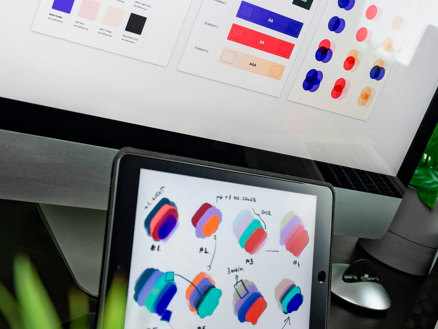 black iPad displaying color gradient