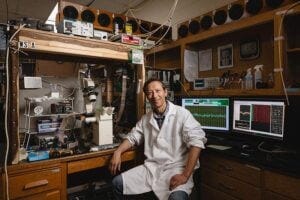With a custom-fabricated experimental chamber housing a “mini-brain,” Purdue researcher Riyi Shi traces the link between concussion and Alzheimer’s disease. (Purdue University photo/Charles Jischke)