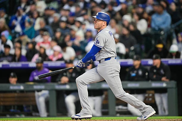 Freddie Freeman of the Los Angeles Dodgers looks on after tripling in the sixth inning during the game between the Los Angeles Dodgers and the...