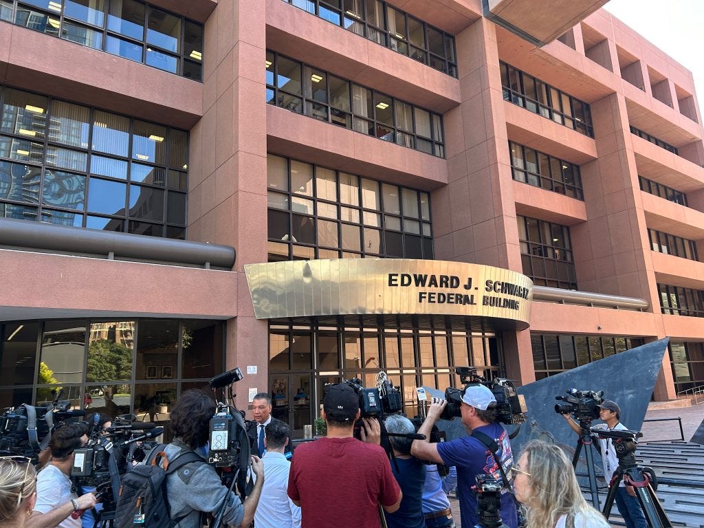 US Senator Alex Padilla speaks to reporters outside the federal courthouse earlier this year