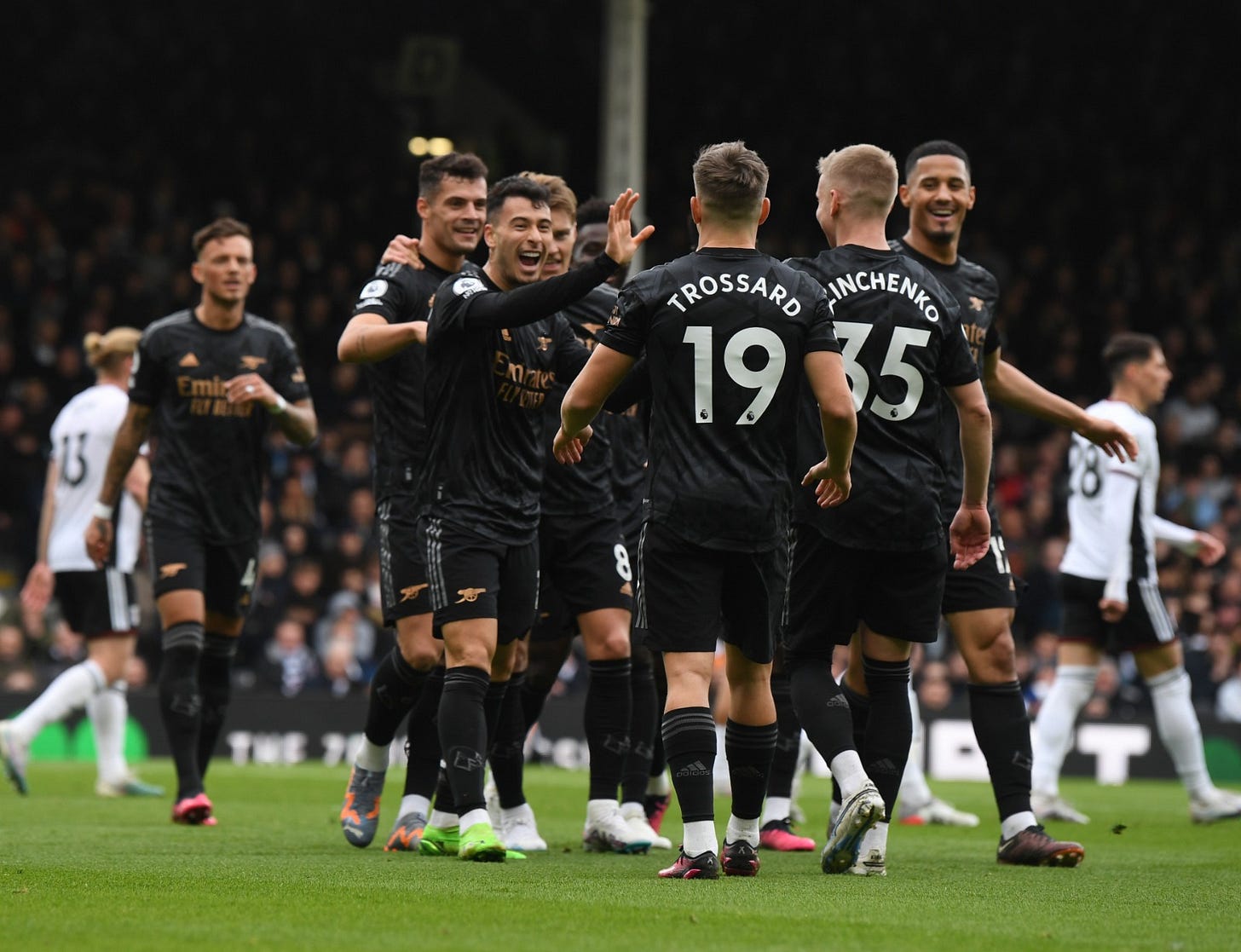The team celebrates Gabriel Martinelli's goal