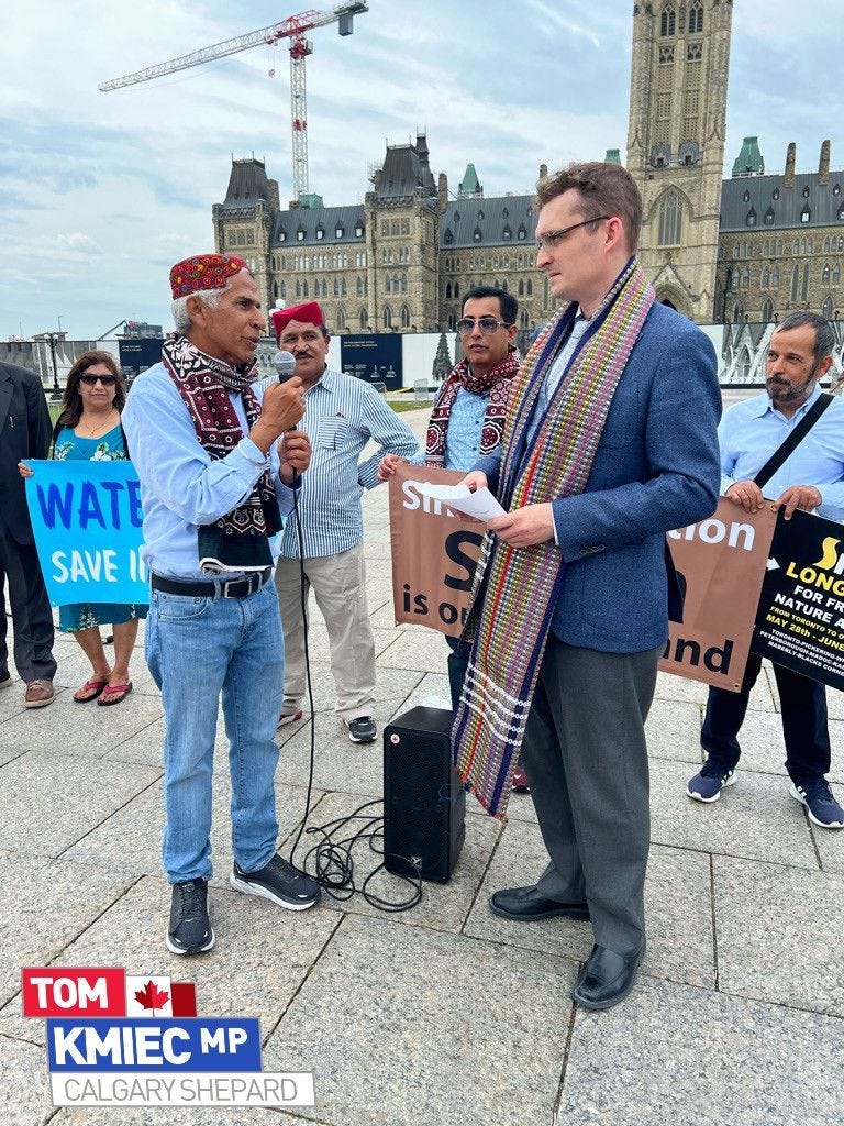 May be an image of 7 people, people standing and outdoors
