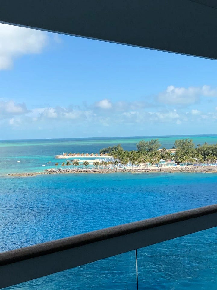 Photos of the Caribbean ocean, the sandy beaches, and water and sky! And a black chick taking pictures of everything and sitting drinking a pineapple drink.