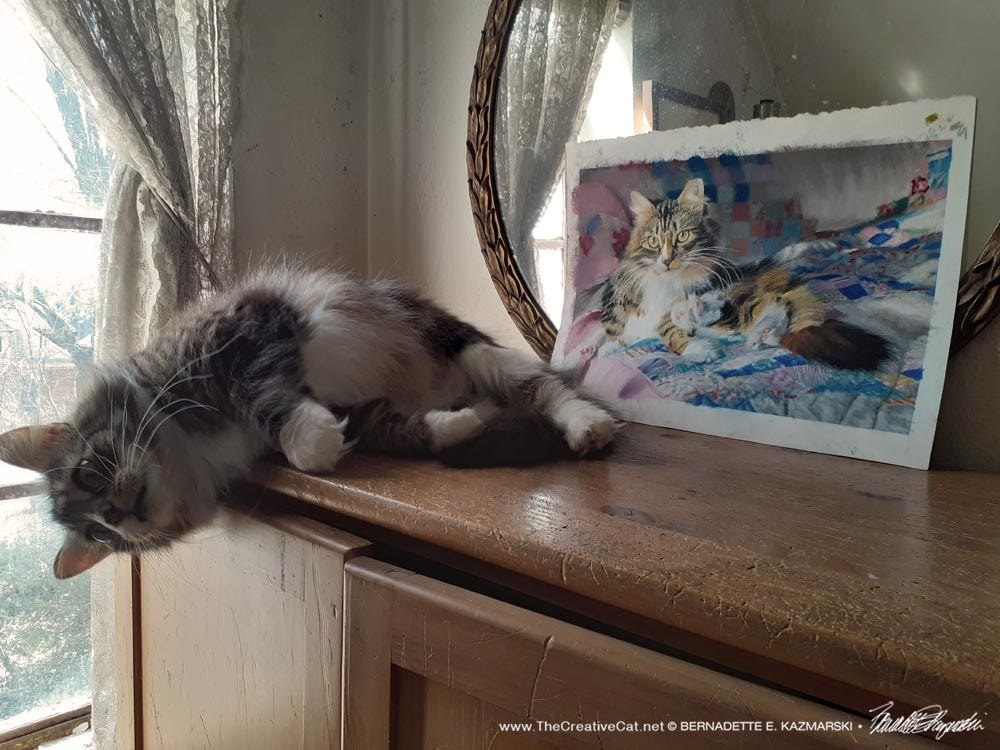 Mariposa looks at her painting
