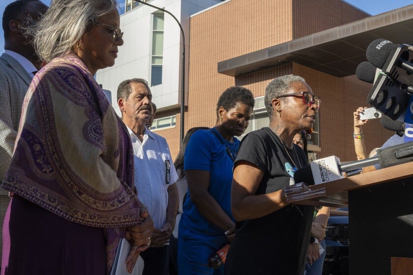 Pertissue Fisher a resident of the apartment complex located at 7500 S. South Shore Dr. recounts her experience being detained by federal law enforcement during a raid on her building last week during a press conference outside of the apartment complex that federal law enforcement recently raided during Operation Midway Blitz, located at 7500 S. South Shore Dr; in the South Shore neighborhood, Sunday, Oct. 5, 2025. | Tyler Pasciak LaRiviere/Sun-Times