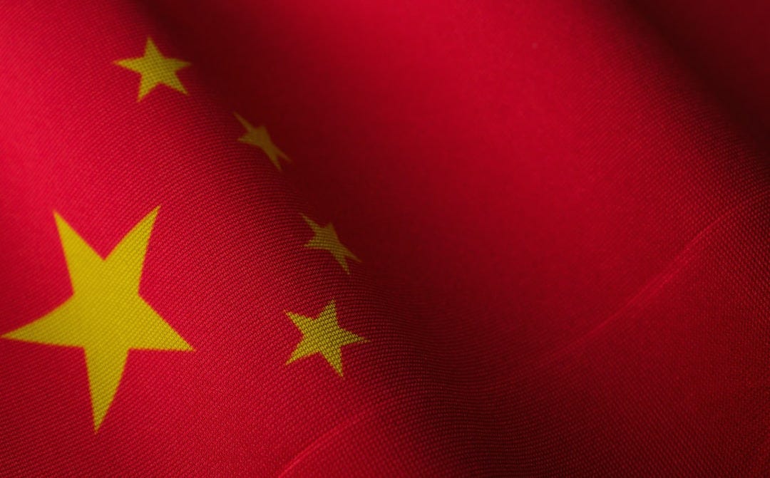 a close up of the flag of china a close up of the flag of china