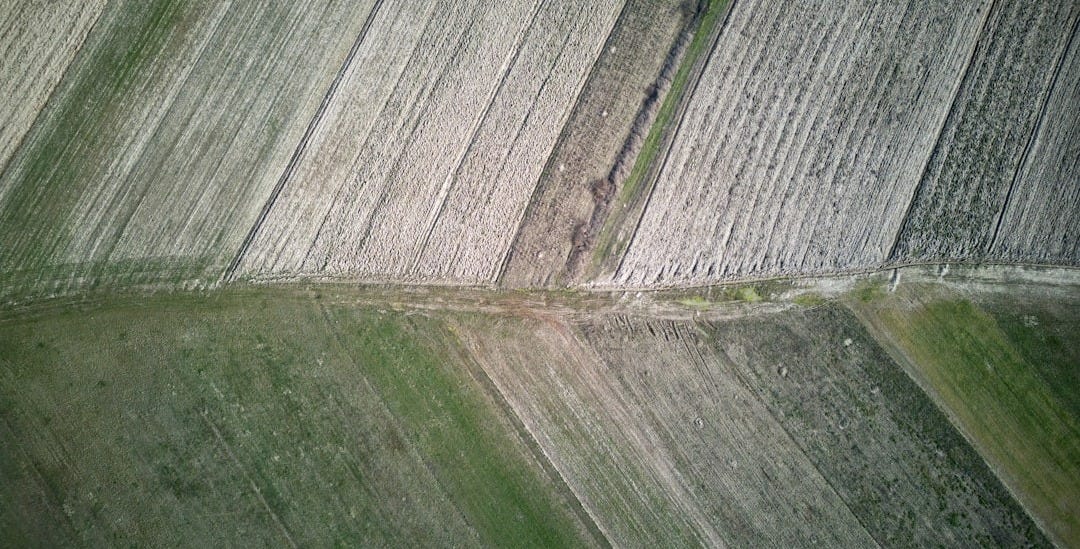 an aerial view of a plowed field