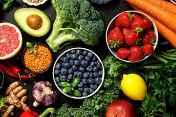 Fruits and vegetables with berries in the center