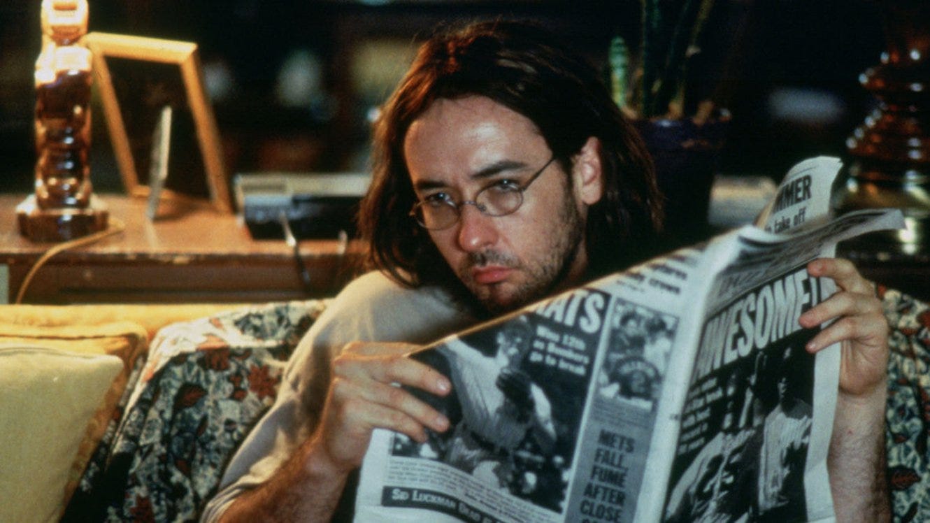 Recensione Essere John Malkovich - Everyeye Cinema