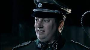 A scene from That Mitchell and Webb look where a pair of Nazis ask the question "What's with all the skulls?"