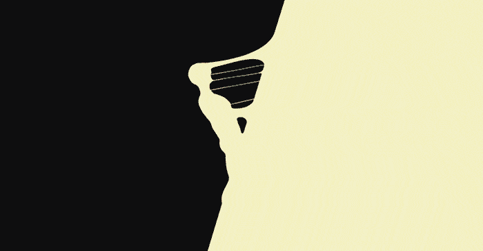 This may contain: the silhouette of a man's head is shown in black and white