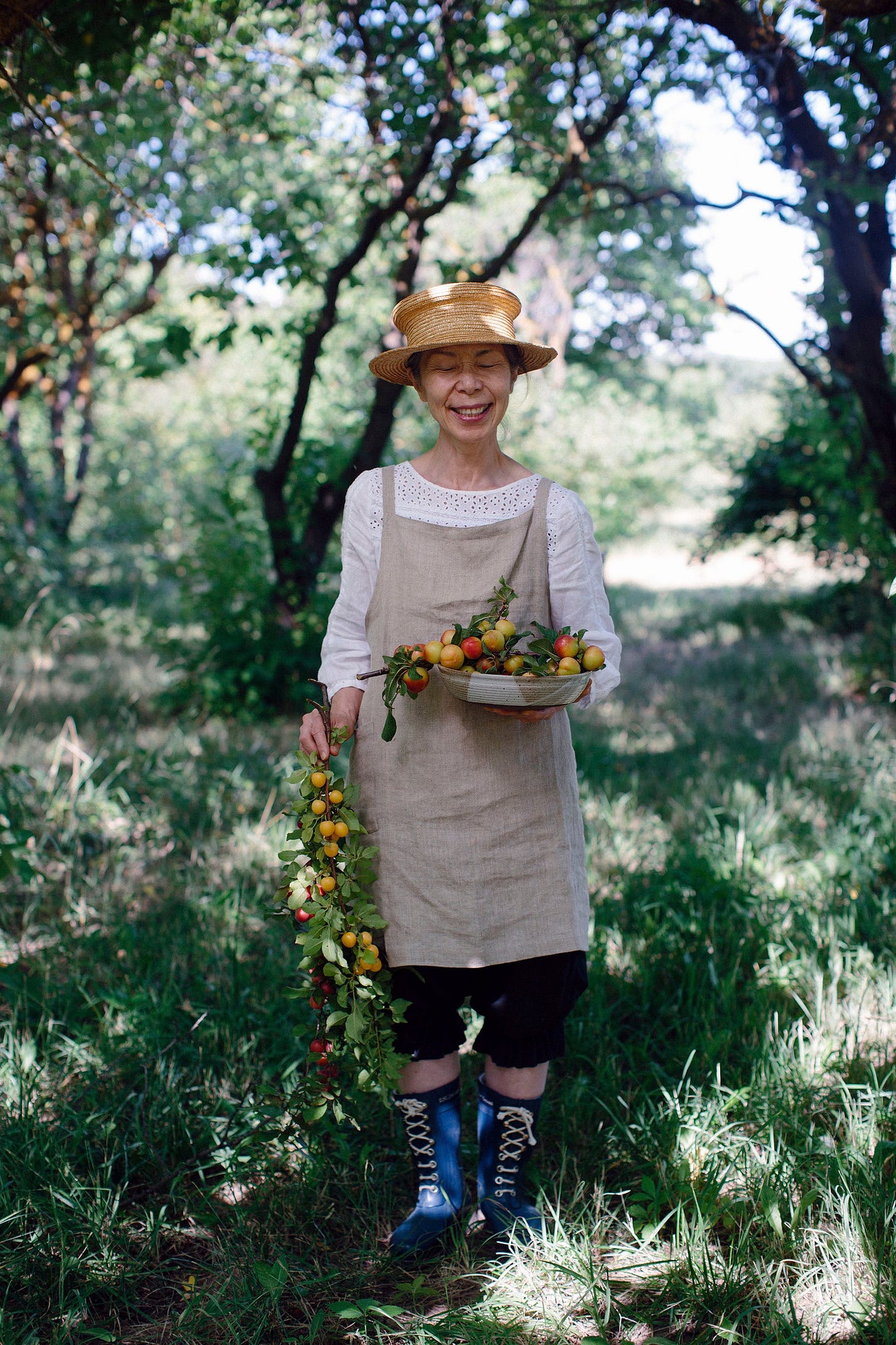 Ayako, a japanese woman in a plum orchard