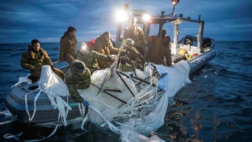 US sailors recover a suspected Chinese high-altitude surveillance balloon that was downed by the United States over US territorial waters off the coast of Myrtle Beach, South Carolina, on February 5, 2023. US sailors recover a suspected Chinese high-altitude surveillance balloon that was downed by the United States over US territorial waters off the coast of Myrtle Beach, South Carolina, on February 5, 2023.