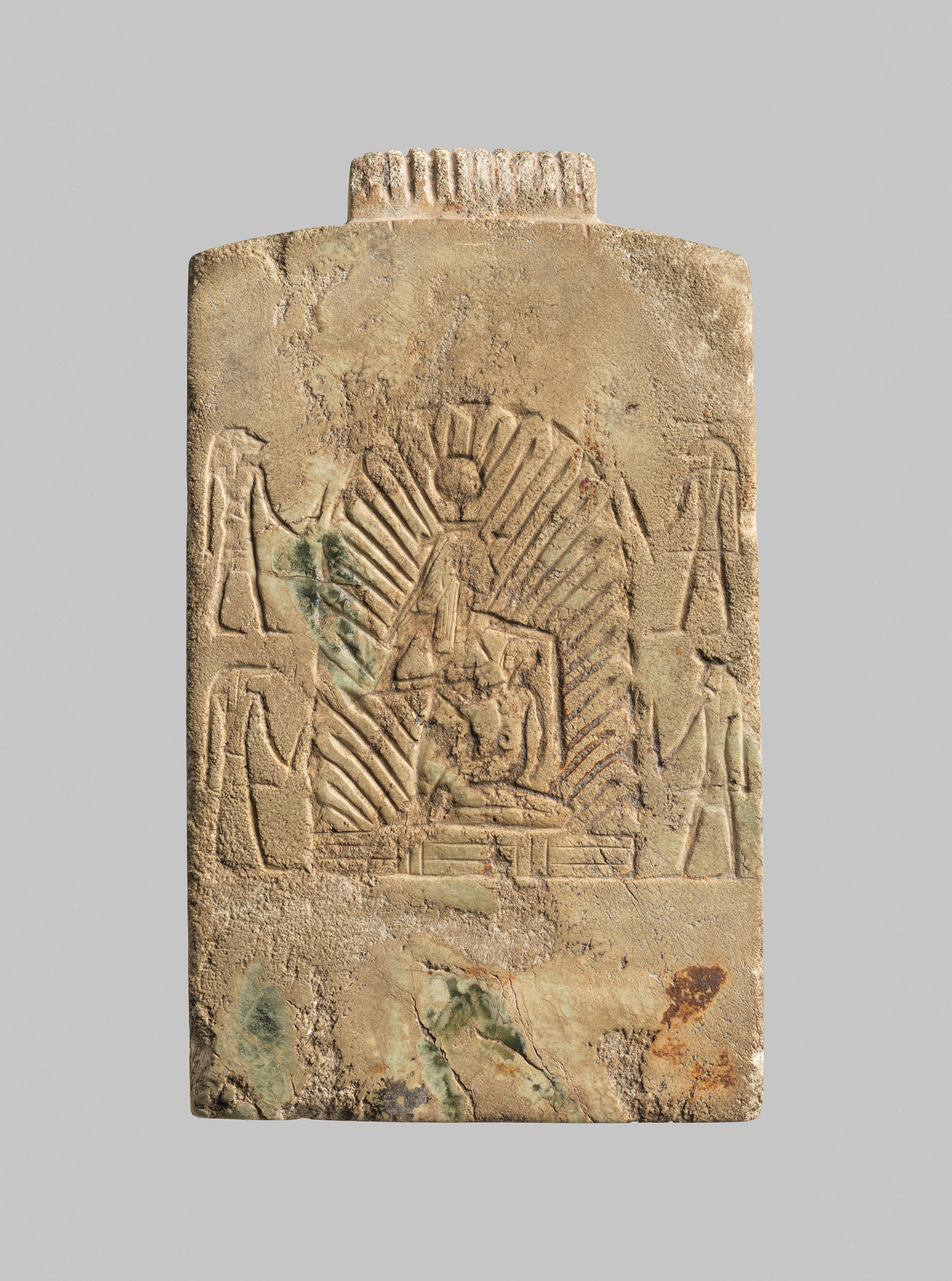 Pectoral depicting Isis nursing infant Horus in the marsh surrounded by protective genii, stone, glazed?