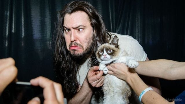 Andrew W.K. with Grumpy Cat, which pretty much sums up the Internet in 2014 Andrew W.K. with Grumpy Cat, which pretty much sums up the Internet in 2014